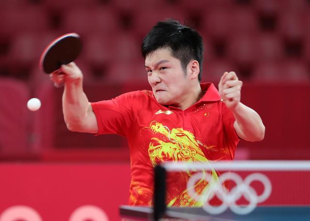 500彩票网赛事集团-马龙樊振东携手晋级八强 日本男单一夜之间被团灭